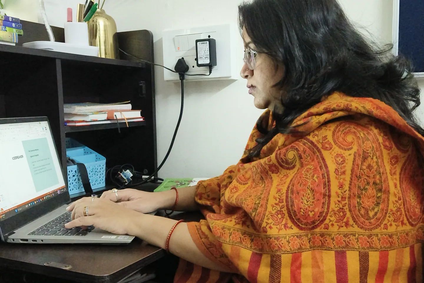 Shruti preparing a live online lesson at her desk