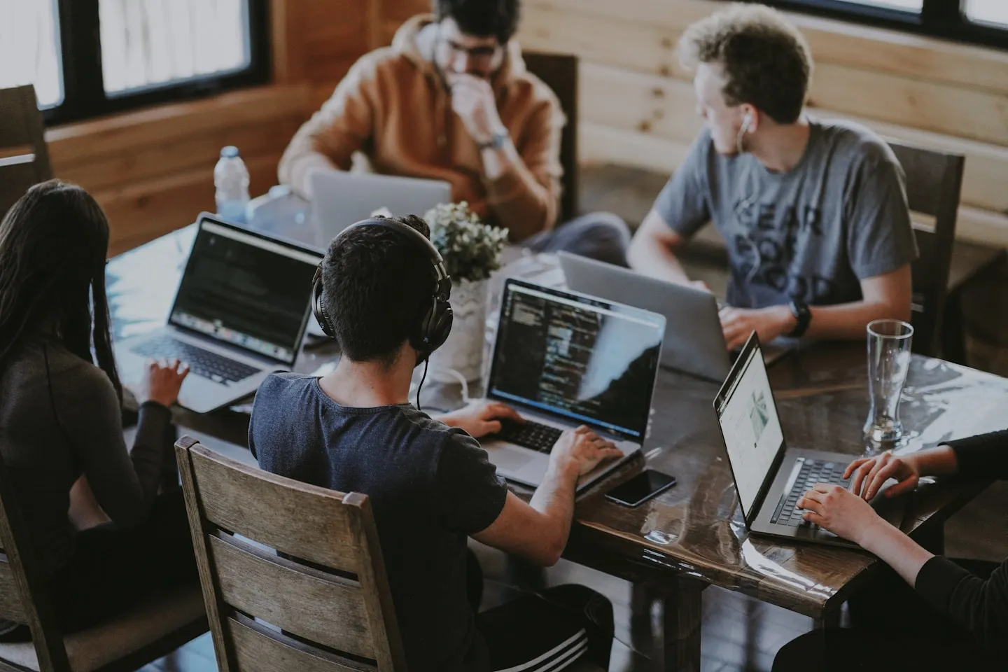 Professionals working together at a shared table